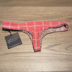 Acacia swimwear bottoms. Size Petite. Reversible pattern on each side in photo